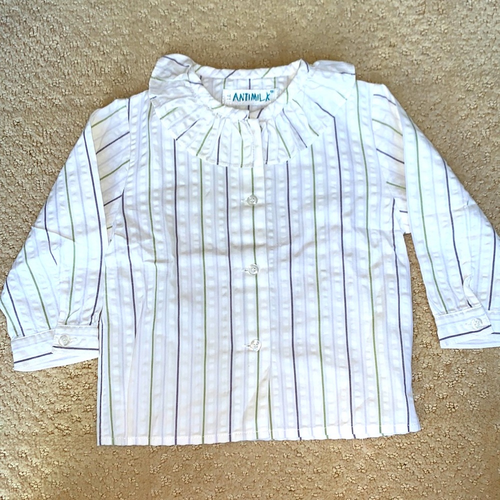 Brand new. Never worn. Tag fell off. Cotton blouse.